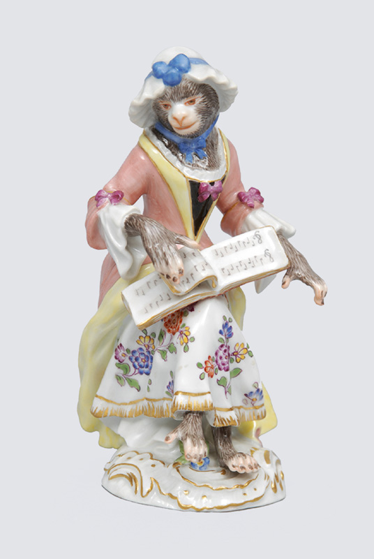 A figurine "female singer" of serial "music playing monkeys"
