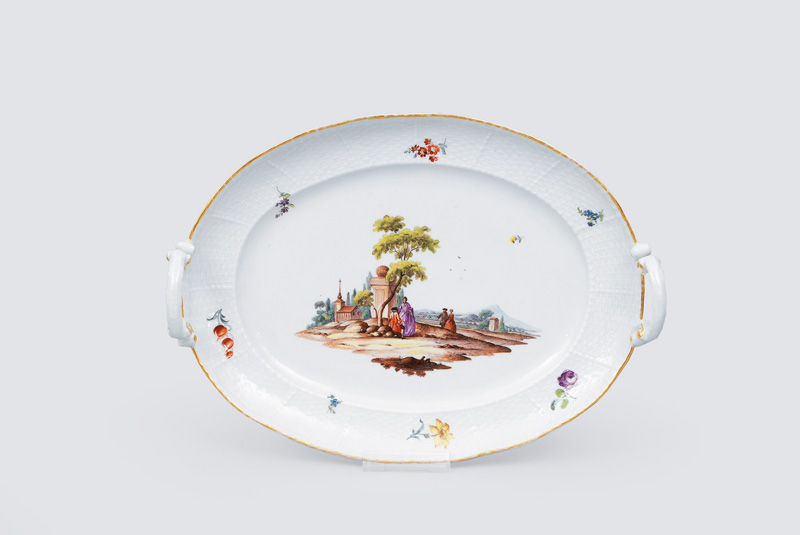 A platter with fine painted Watteau scene
