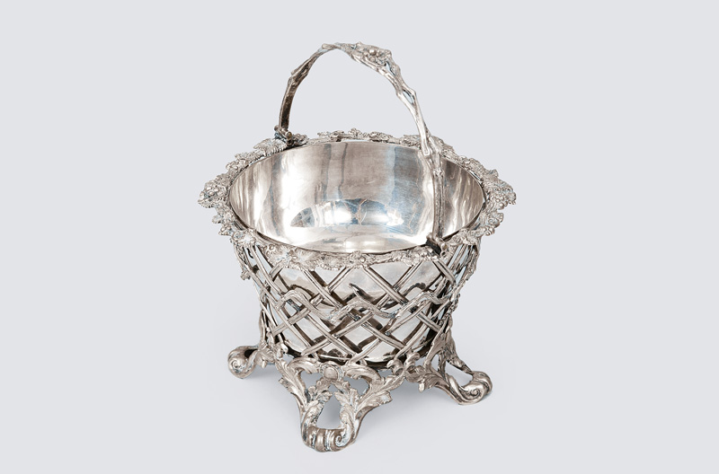 A Biedermeier baskett with ornaments of grapes