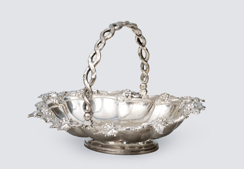 A humped bowl with grape-shaped frieze