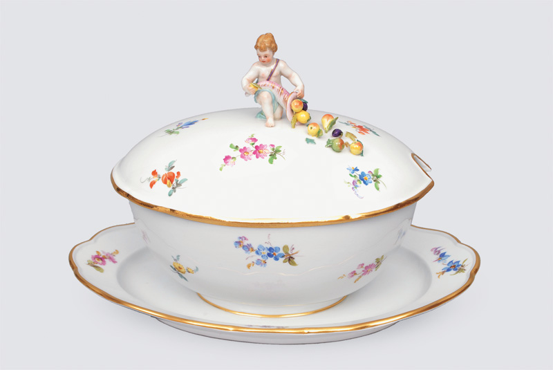 A big sauce boat "strewn flowers" with putto knob