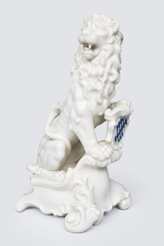 A figurine "bavarian lion" on volute base