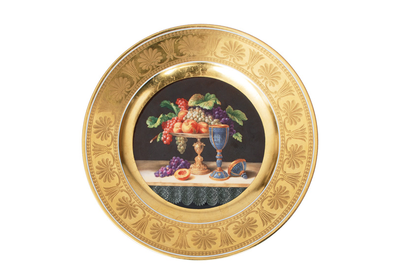 A pompous plate with fine painted still life