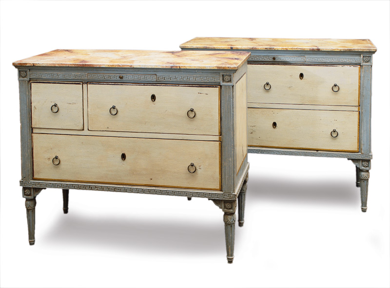 A pair of coloured Louis-Seize chest of drawers