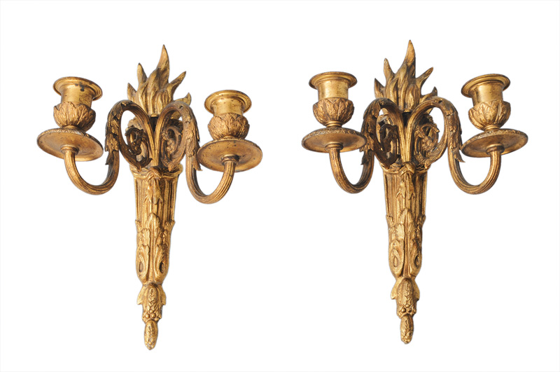A pair of wall lights in classical style