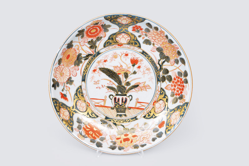 A flat Imari bowl with floral painting