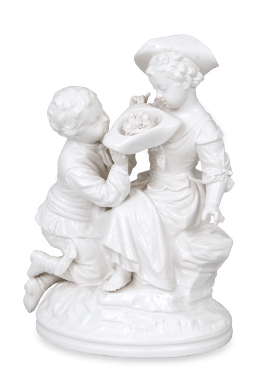 A figurine group "Rococo couple with bird nest"