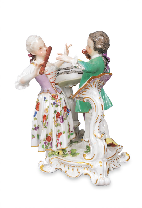 A figurine group "Children playing the transverse flute"