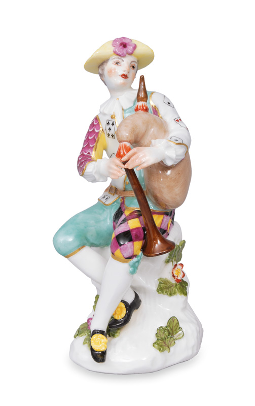 A rare figurien "Harlequin with bag pipe"