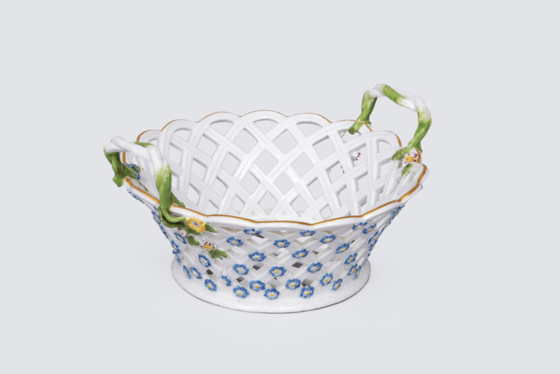 A openwork basket with forget-me-not decoration
