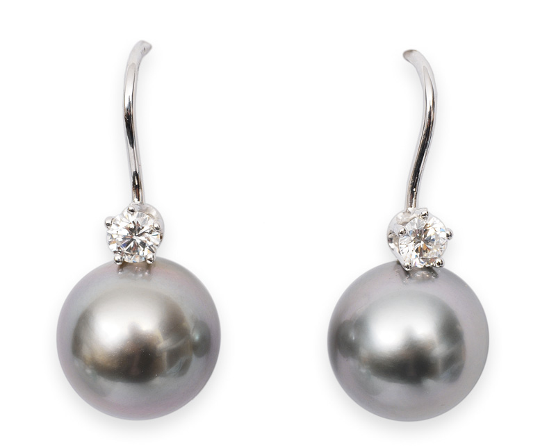 A pair of pearl-diamond-earrings