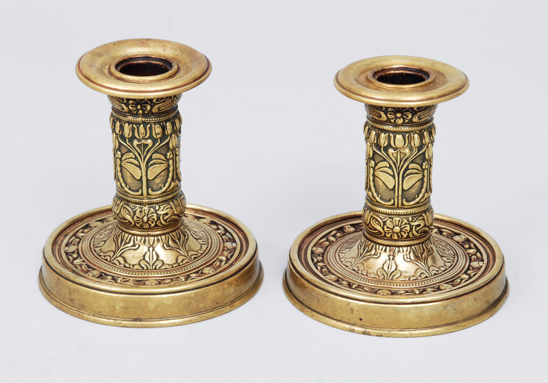 A pair of small Art-Nouveau table candle holders