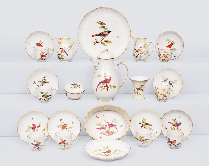 - A coffee service with painting of birds and basket-shaped relief for 8 persons A coffee service with painting of birds and basket-shaped relief for 8 persons