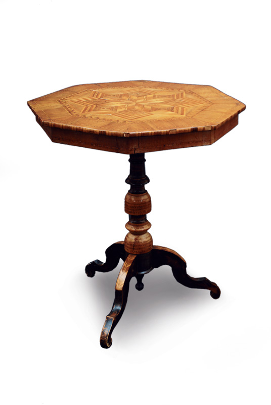 A small tea table with inlays of stars