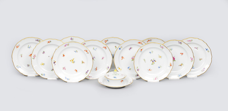 - A set of 11 plates and 1 butter dish with scattered flowers and gilded rim A set of 11 plates and 1 butter dish with scattered flowers and gilded rim