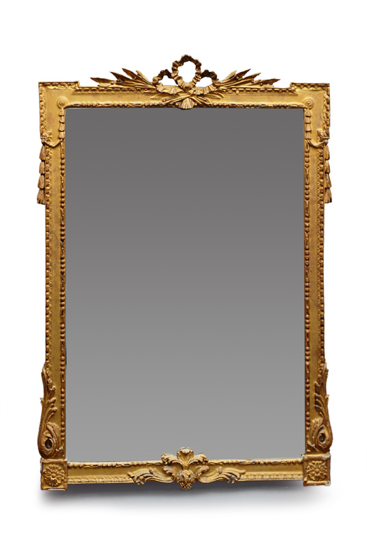 A large mirror with fine Empire ornament