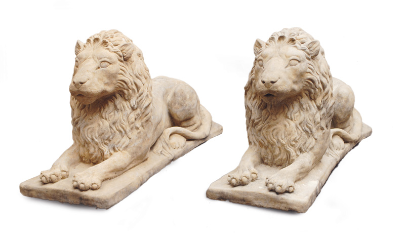 A garden figure "laying lion" on rectangular base