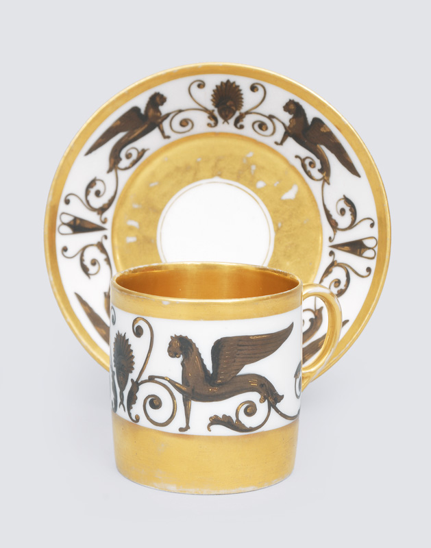 A cup with mythical creature in sepia painting