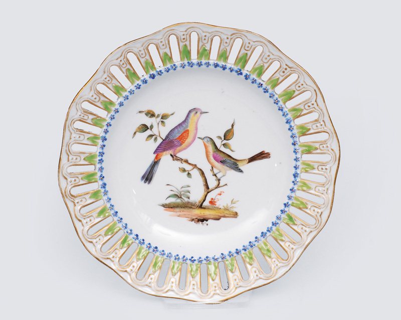 An openwork plate with fine bird painting