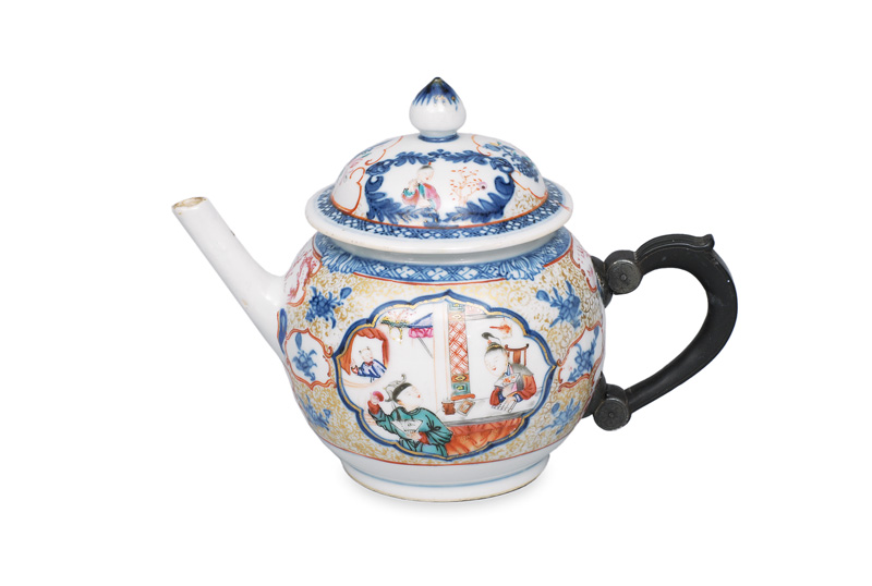 A tea pot with figural scene