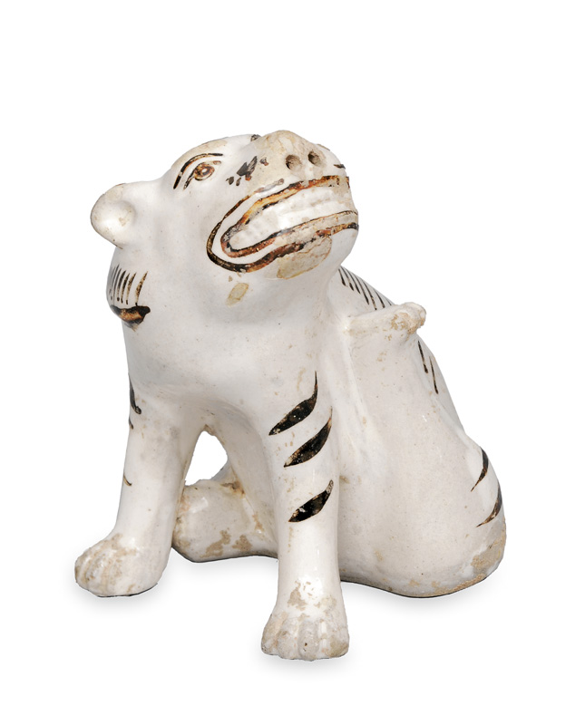 A figurine "sitting tiger"