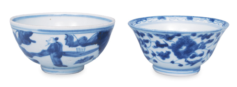 A pair of small bowls with blue painting