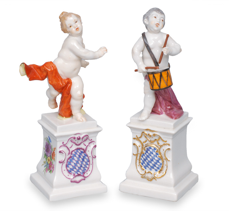A pair of figurines "Running putto" and "Putto as drummer"