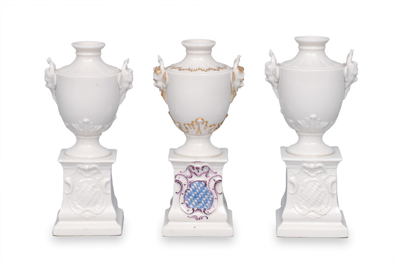 A set of 3 amphora vases with satyr handles