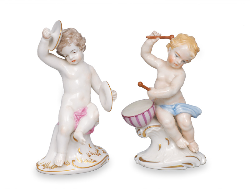 A pair of putti playing music