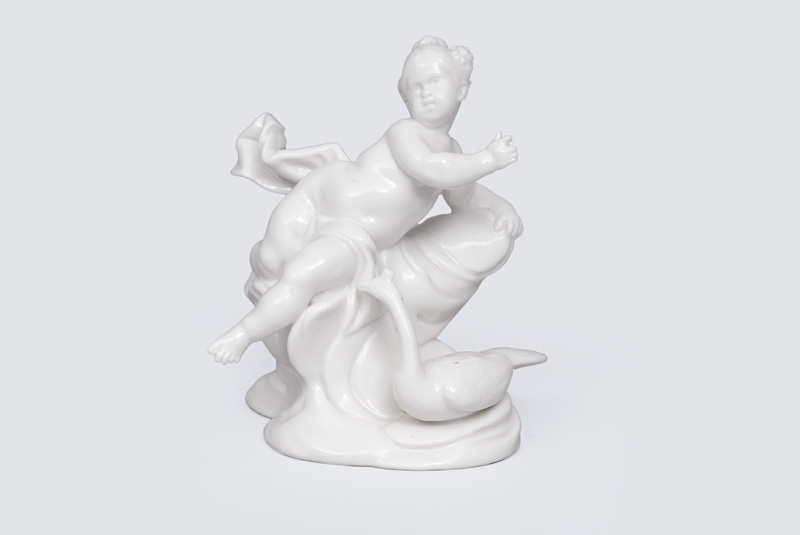 A small figurine "Putto as Juno"