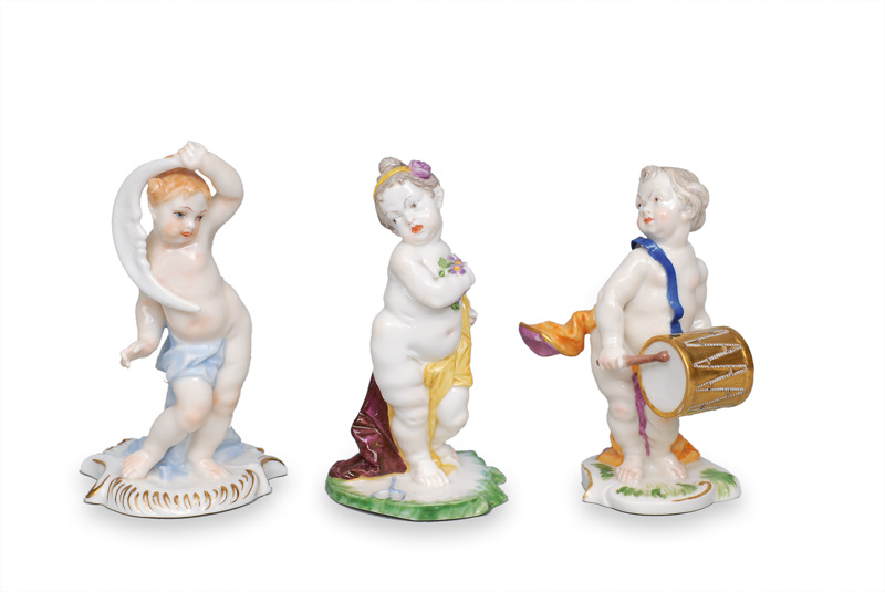 A set of 3 putto figurines