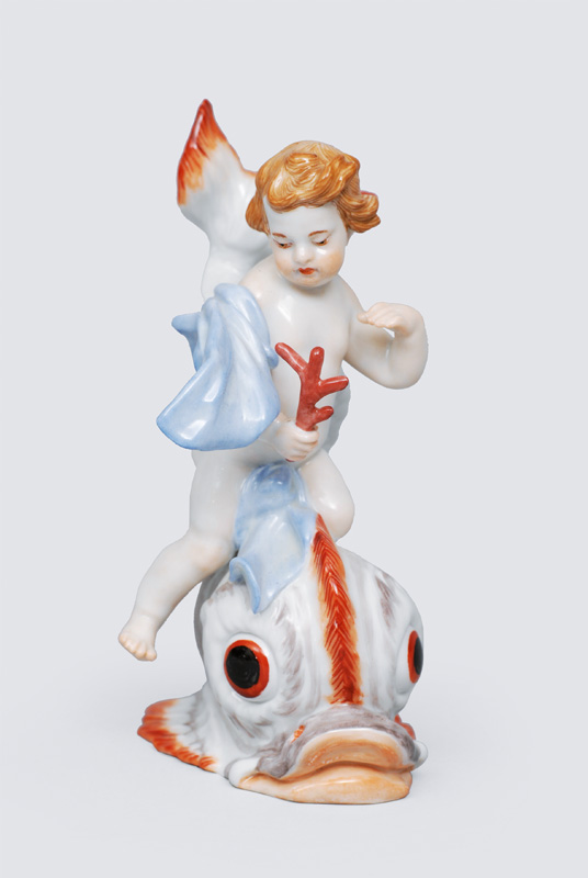 A small figurine "Putto seated on dolphin" of serial "Swan design"