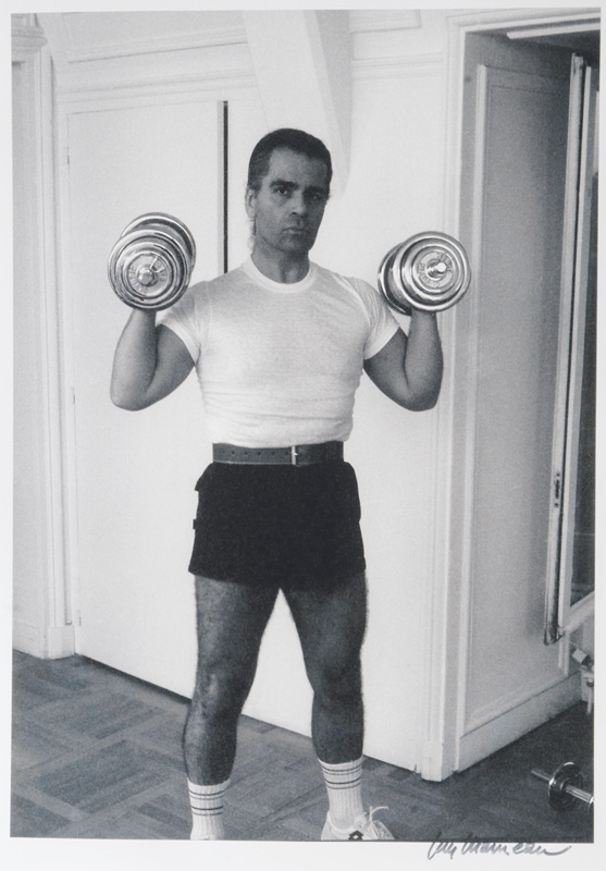 The young Karl Lagerfeld holding dumb-bells