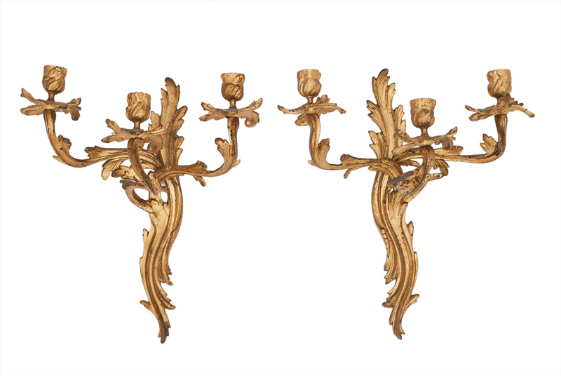 A pair of sconces in the style of Rococo