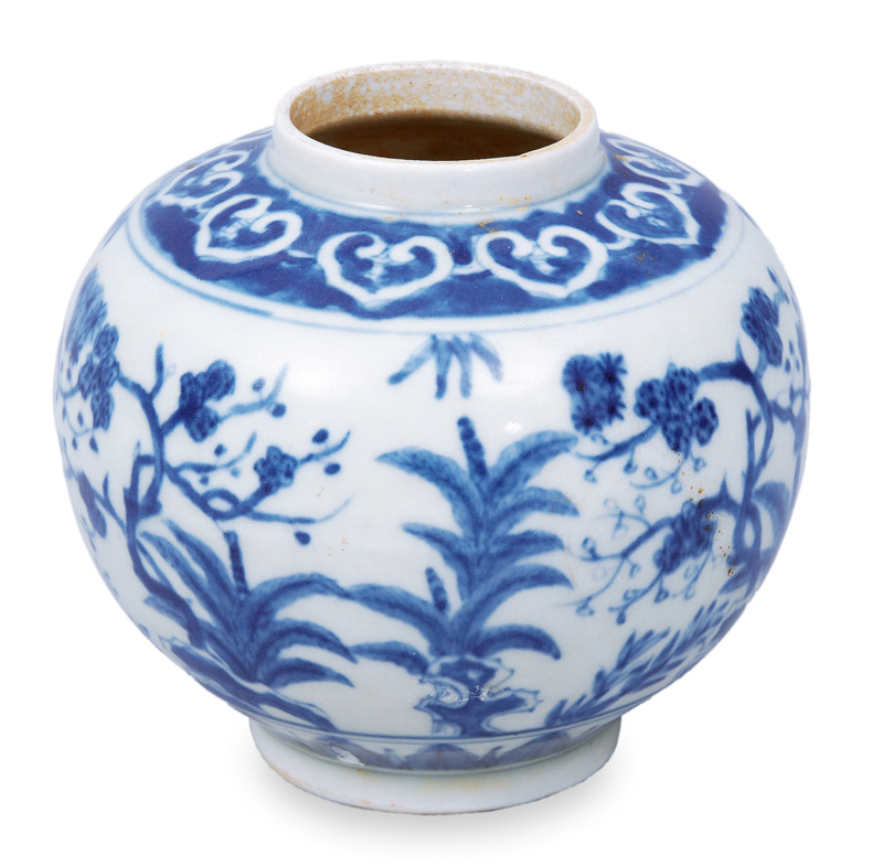 A small vase with floral painting in blue