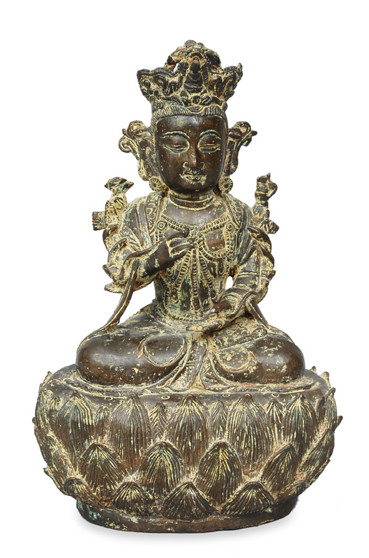 A Guanyin figure seated on lotus throne