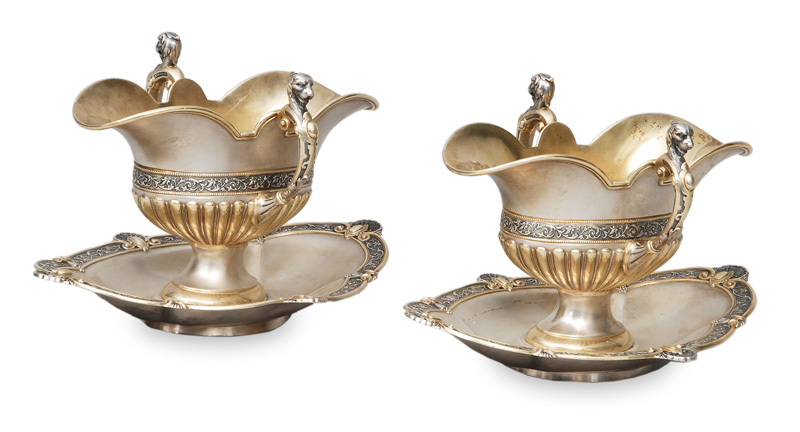 A pair of elegant gravy boats