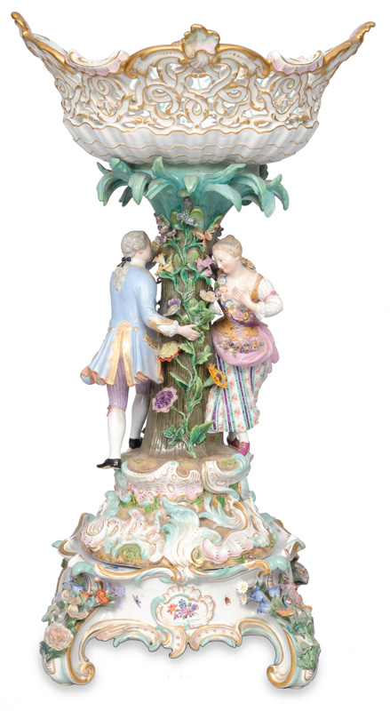A pompous centre piece with a rococo couple and base