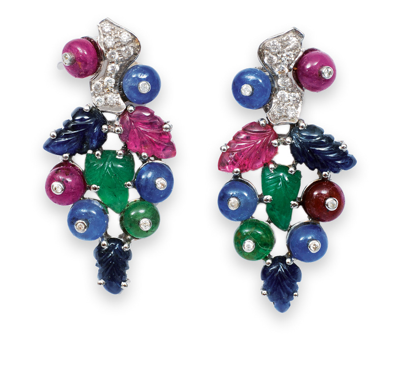 A pair of sapphire ruby emerald earrings with diamonds