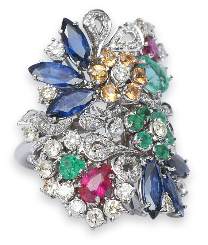 A flowershaped ring with coloured stones and diamonds