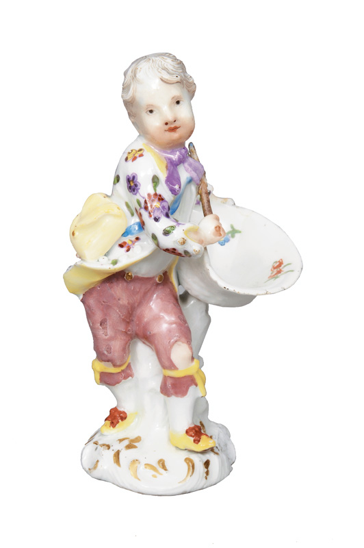 A figurine of a gardener"s child with a basket
