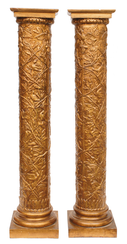A pair of gilded columns