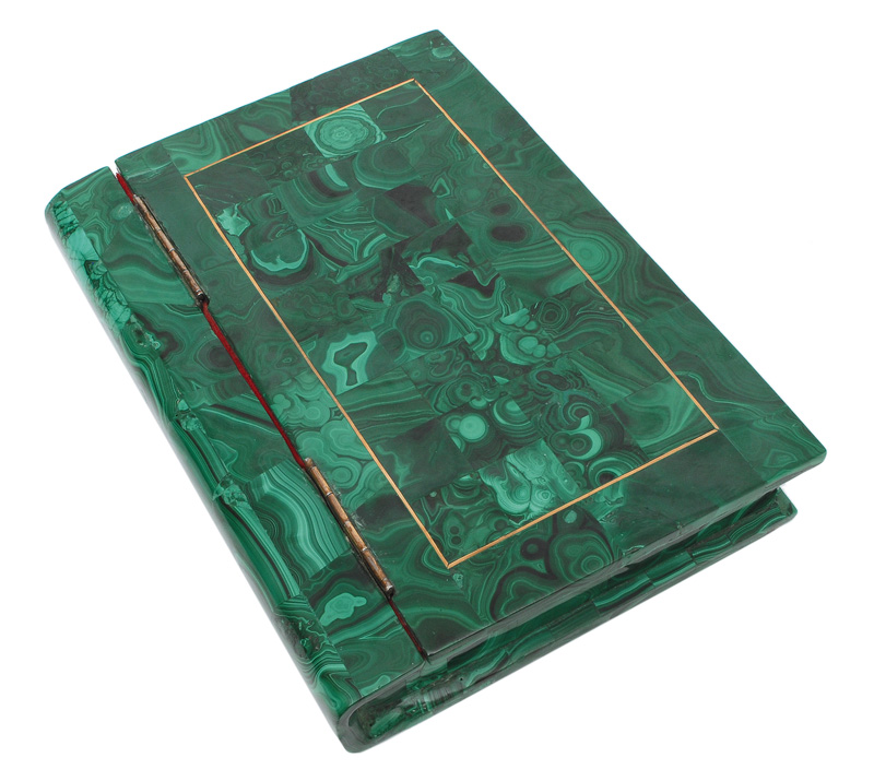 A hug malachite casket in the shape of a book