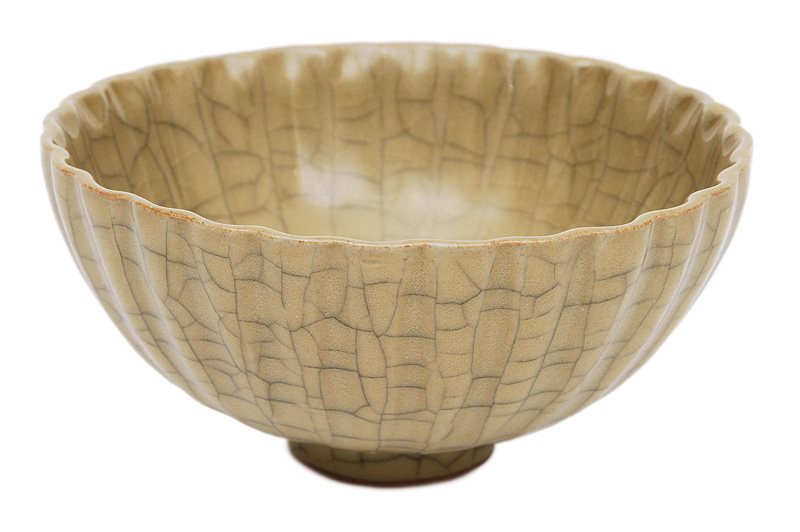 An olive green celadon bowl