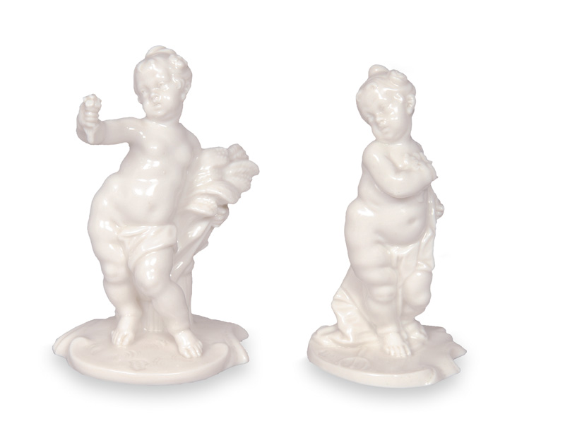 A pair of figurines "Putto as Ceres" and "Putto as Flora"