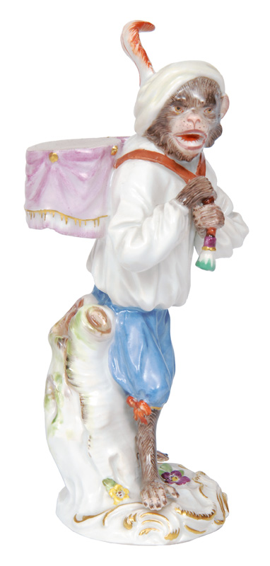 A figurine "Kettle drum carrier" of serial "Music playing monkeys"