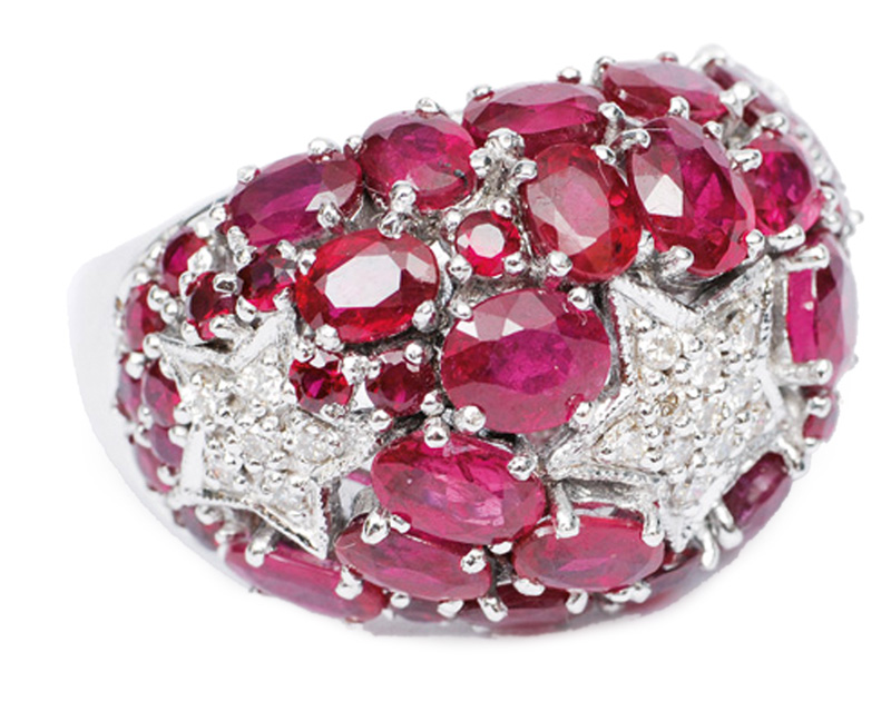 A large ruby diamond ring with ornaments of stars