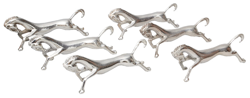 A set of 6 knife rests in the shape of a horse