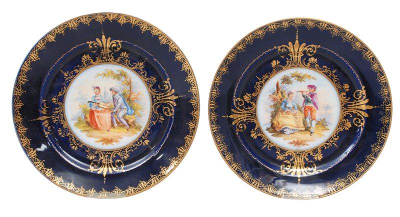 A pair of cobalt blue grounded plates with Boucher szenes in styl of Vienna