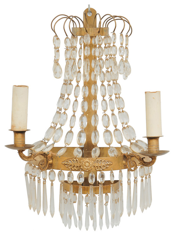 A pair of wall lights with crystal hanging